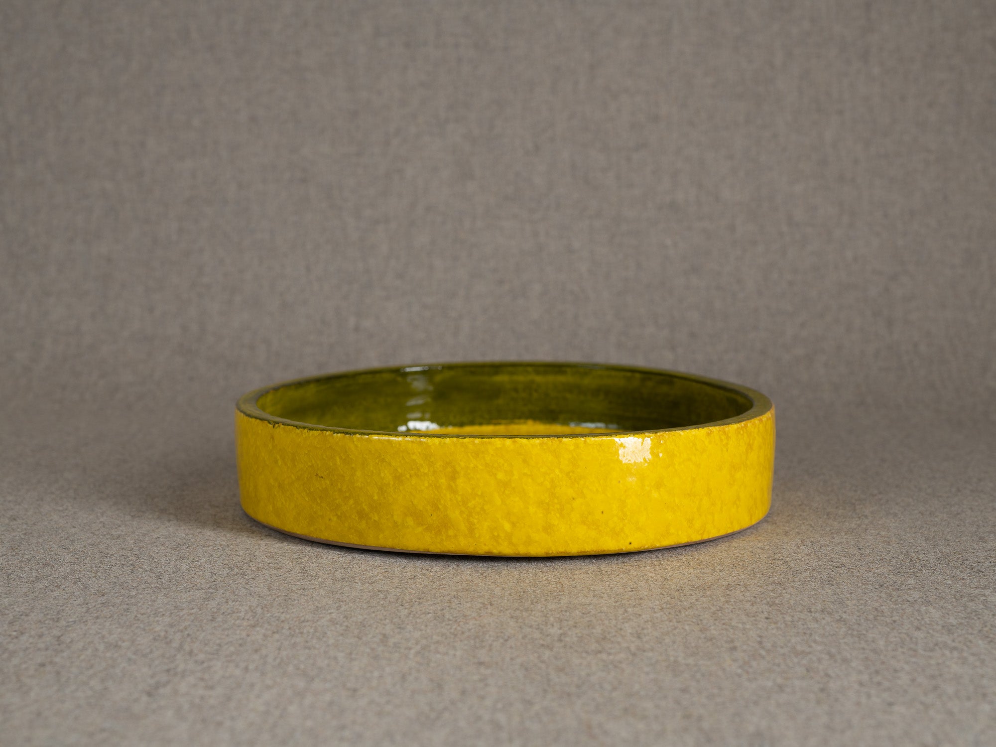 Rare coupe circulaire en faïence par Aldo Londi pour Bitossi, Italie (vers 1960)..Rare earthenware circular bowl by Aldo Londi for Bitossi, Italy (circa 1960)