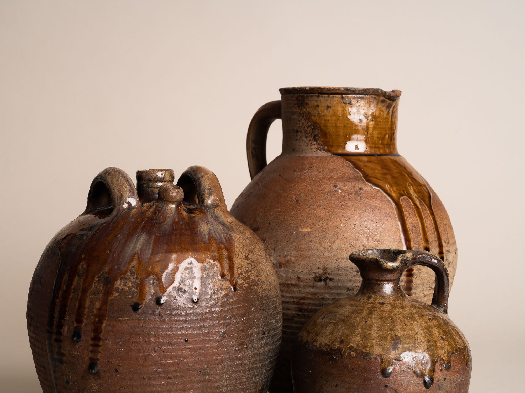 Ensemble de pots en grès de Puisaye, France (XVIIIe et XIXe siècles)..Set of stoneware folk pots by anonymous Puisaye potters, France (18th & 19th century)