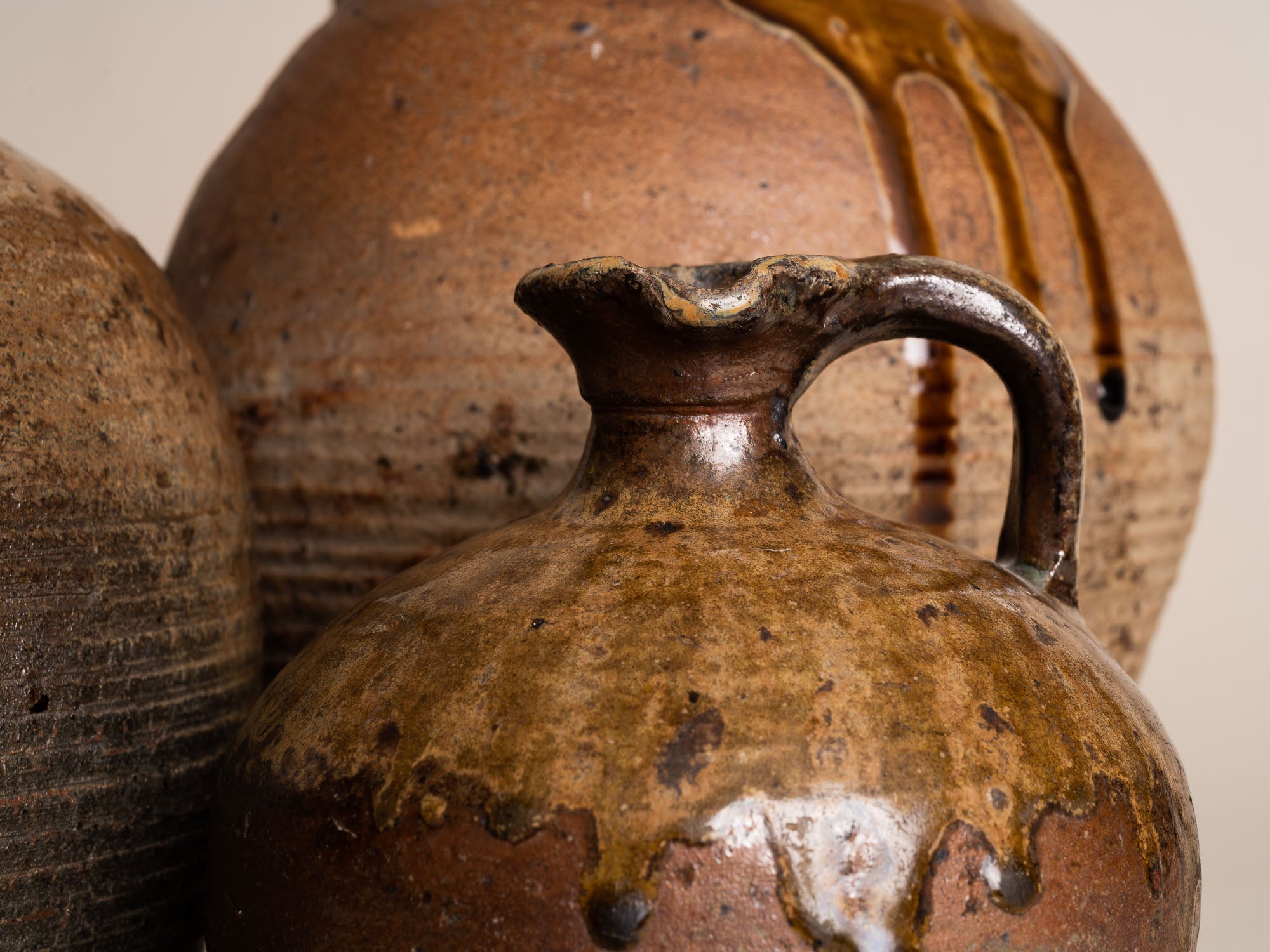 Ensemble de pots en grès de Puisaye, France (XVIIIe et XIXe siècles)..Set of stoneware folk pots by anonymous Puisaye potters, France (18th & 19th century)