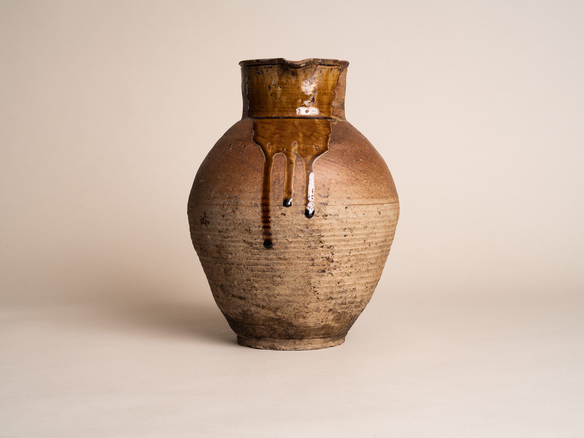 Ensemble de pots en grès de Puisaye, France (XVIIIe et XIXe siècles)..Set of stoneware folk pots by anonymous Puisaye potters, France (18th & 19th century)