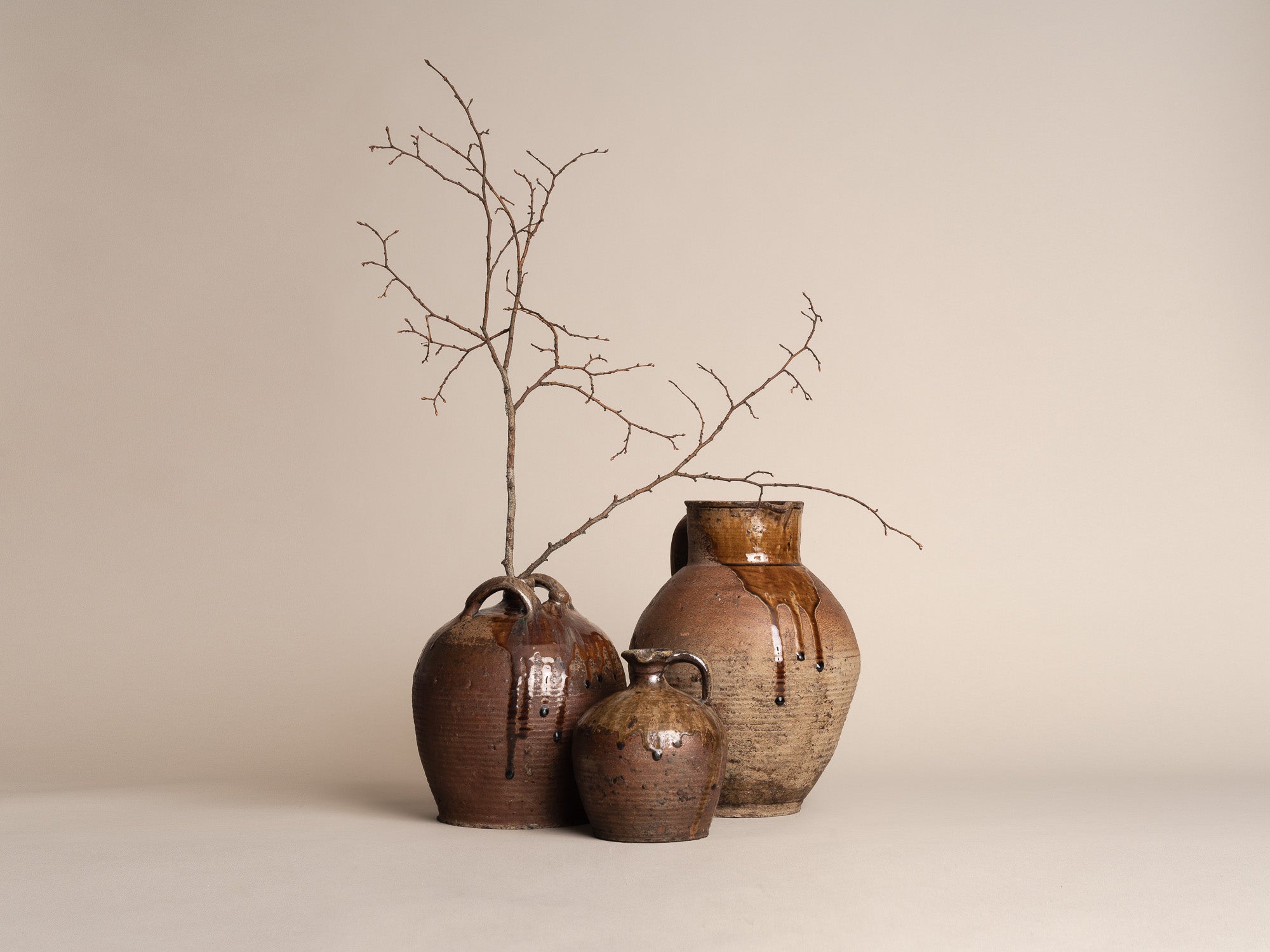 Ensemble de pots en grès de Puisaye, France (XVIIIe et XIXe siècles)..Set of stoneware folk pots by anonymous Puisaye potters, France (18th & 19th century)