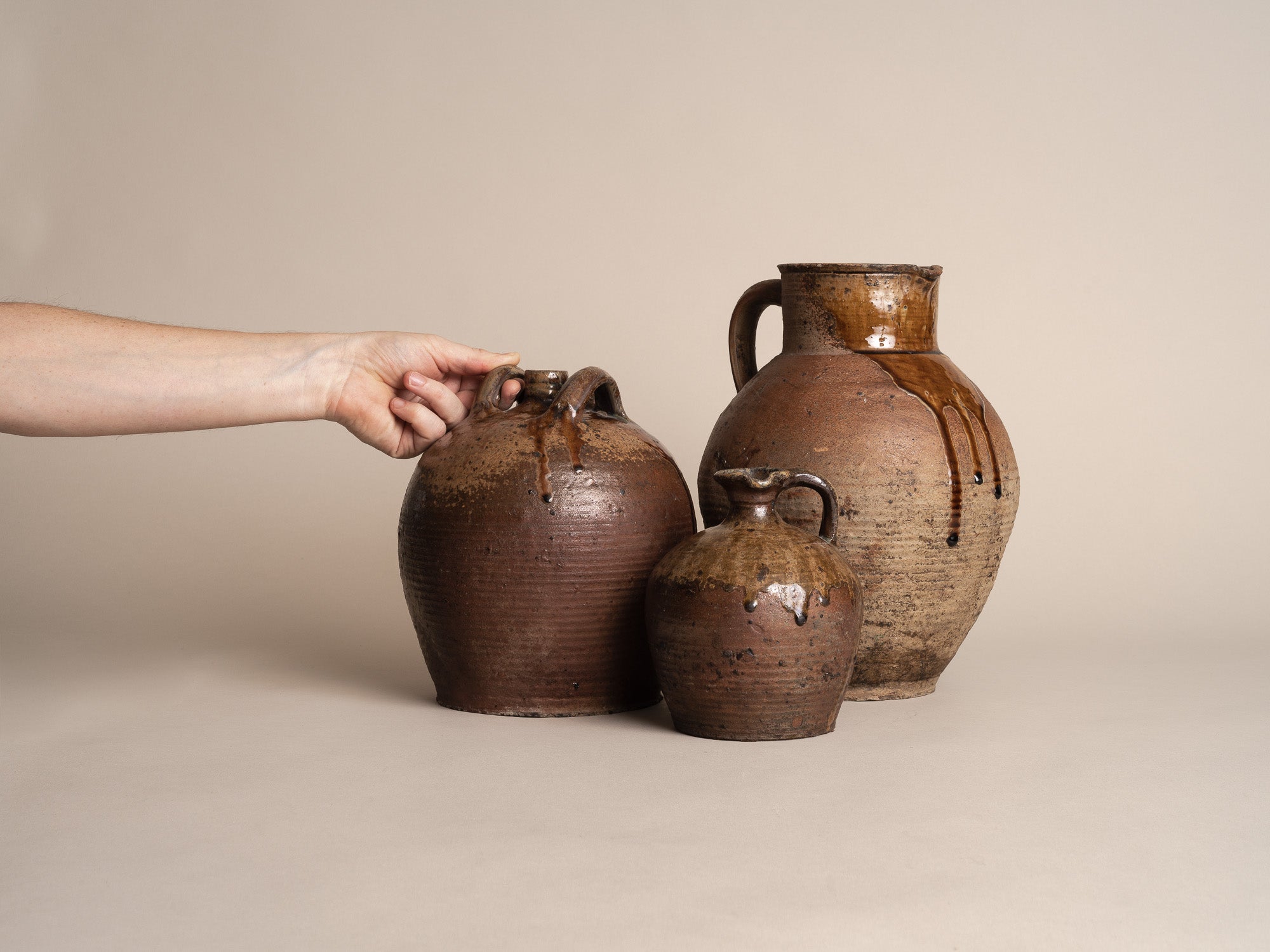 Ensemble de pots en grès de Puisaye, France (XVIIIe et XIXe siècles)..Set of stoneware folk pots by anonymous Puisaye potters, France (18th & 19th century)