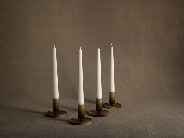 Rare suite de quatre flambeaux par Carl&#x2011;Einar Borgström pour Ystad Metall, Suède (vers 1939)..Set of 4 swedish grace candle holders by Carl&#x2011;Einar Borgström for Ystad Metall, Sweden (circa 1960)
